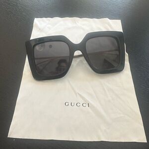 Gucci oversized black sunglasses with gold stems